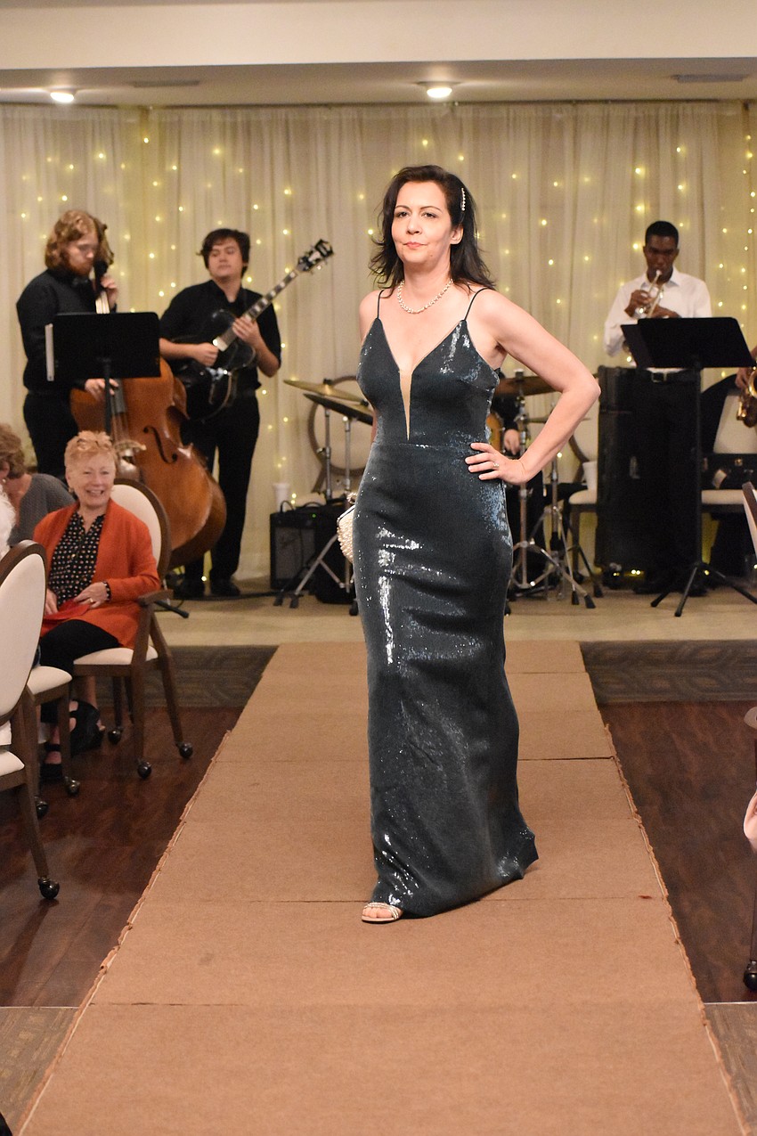 Palm Aire's Chiara Roveggia shows off an elegant dress during her trip down the runway.