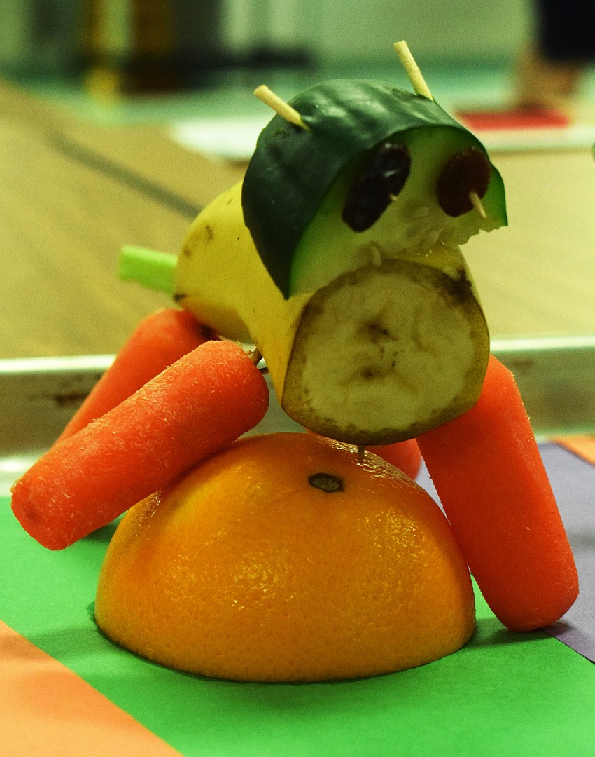 Fourth graders Archer Miles, Wyeth Hudson and Martin Torres attempted to create a panther out of carrots, a banana and a cucumber.