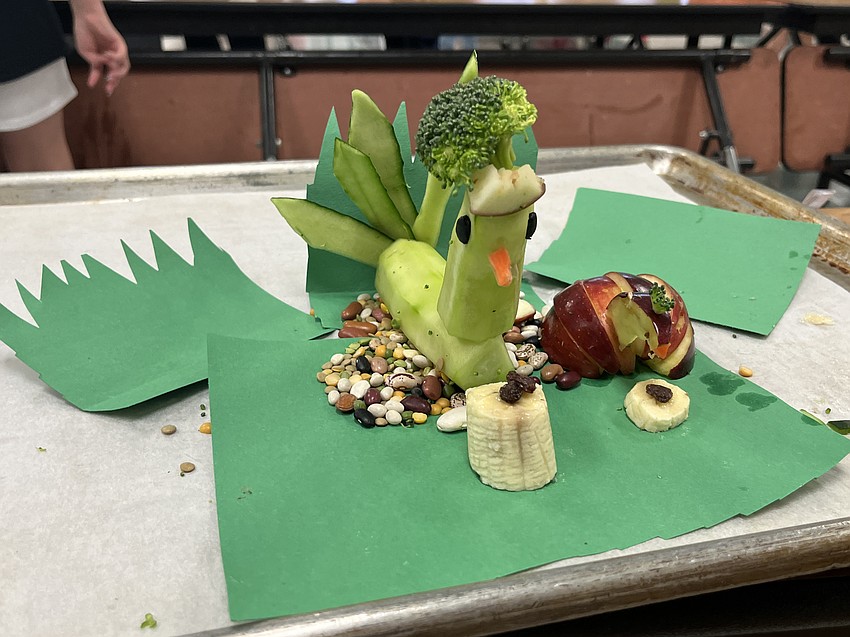 This entry uses cucumbers, broccoli and nuts to create a peacock.