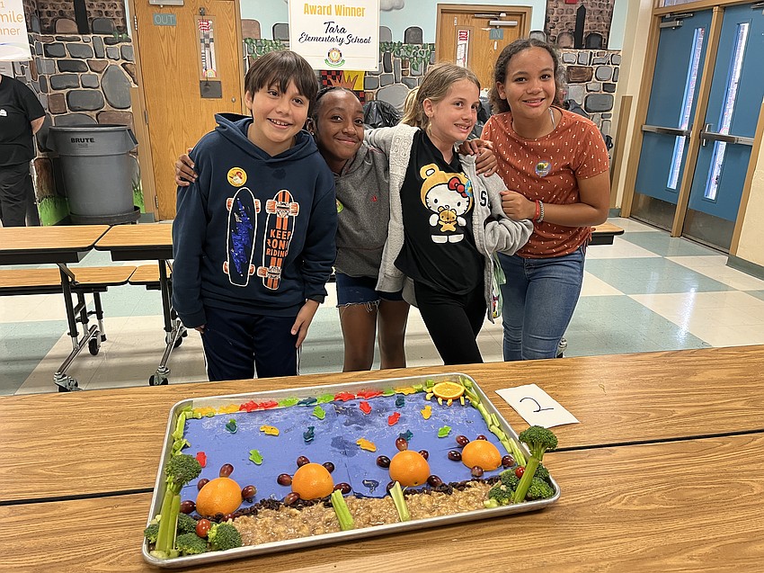 Fifth graders Santiago Olvera, Dailaini Ward, Zailee Segars-Lopez and Bella Randall are thrilled with a second-place finish.