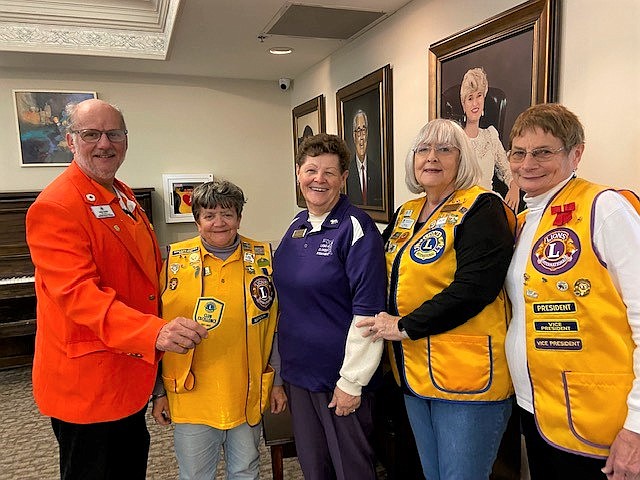 Ormond-by-the-Sea Lions Club members President Greg Evans, Secretary Jean Cerullo, Second Vice President Bobbie Cheh, Treasurer Aleta Dick and Past President Mary Yochum show off the Club Excellence Patch at the Conklin-Davis Center. Courtesy photo