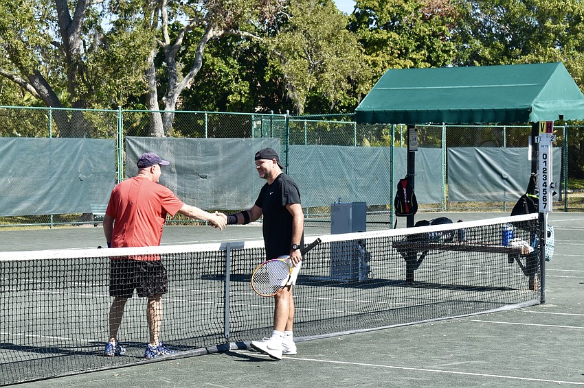David Campbell and Nelson Cabrera shake hands after the finals.