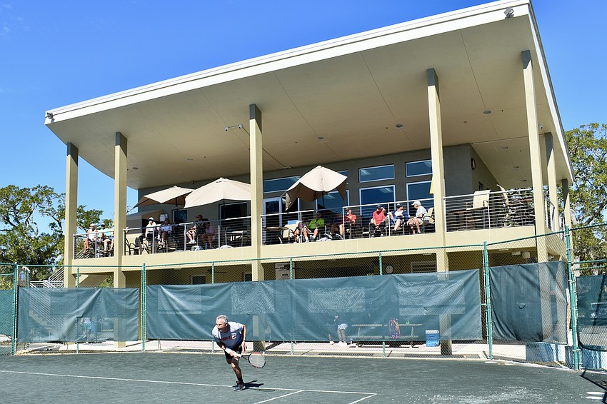 Spectators watch from above as Mark Halpin plays in the Division 1 finals.