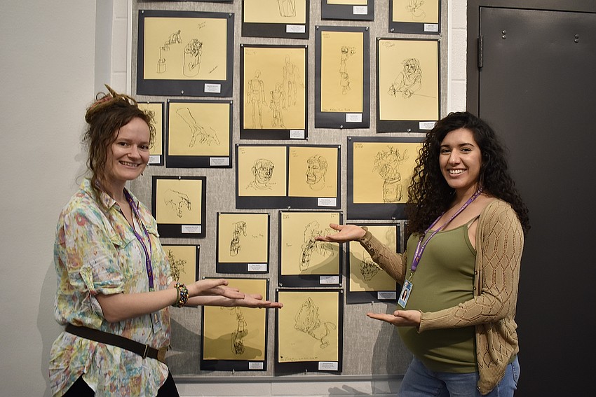 Stephanie Rischard and Paula Grafton showcase the Booker students' artwork.