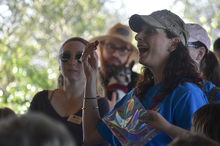 Snait Ben-Herut teaches the significance of the almond tree to the students.