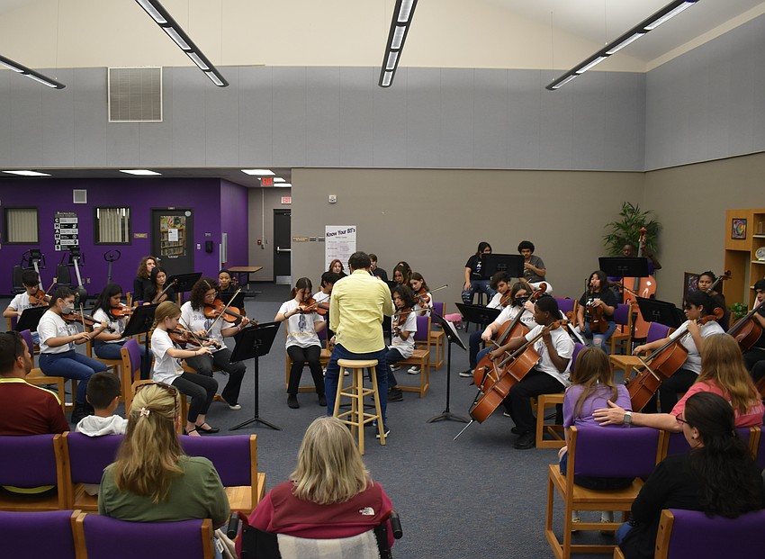 Booker Middle School Orchestra performs for the community members at Bookerfest.