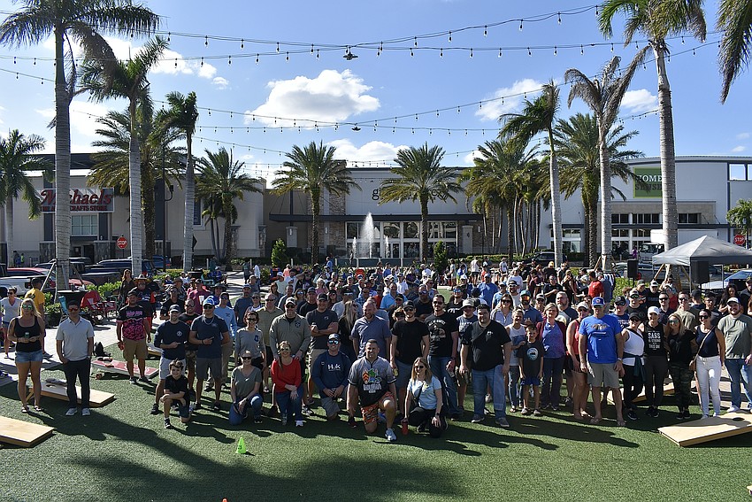 The Sarasota Police Department held a charity corn hole tournament at UTC’s The Green on Feb. 4