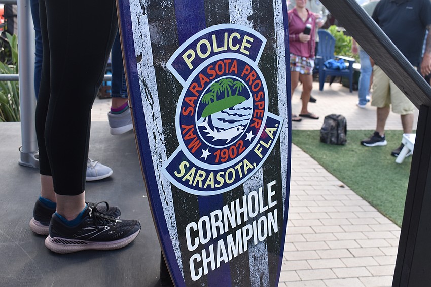 The Sarasota Police Department held a charity corn hole tournament in support of Officer Tim Dedrick who lost his wife, Crystal Dedrick, in a car accident.