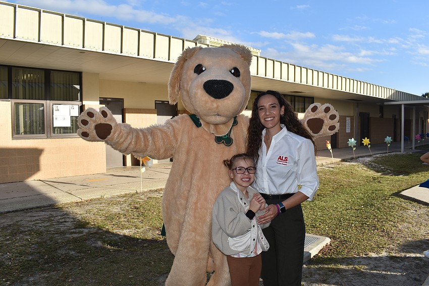 Bayfront mascot Cash, Ashia and Dakota Zayas.
