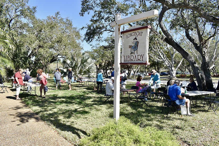 The Longboat Library attracts a good crowd for their book sale on Saturday.