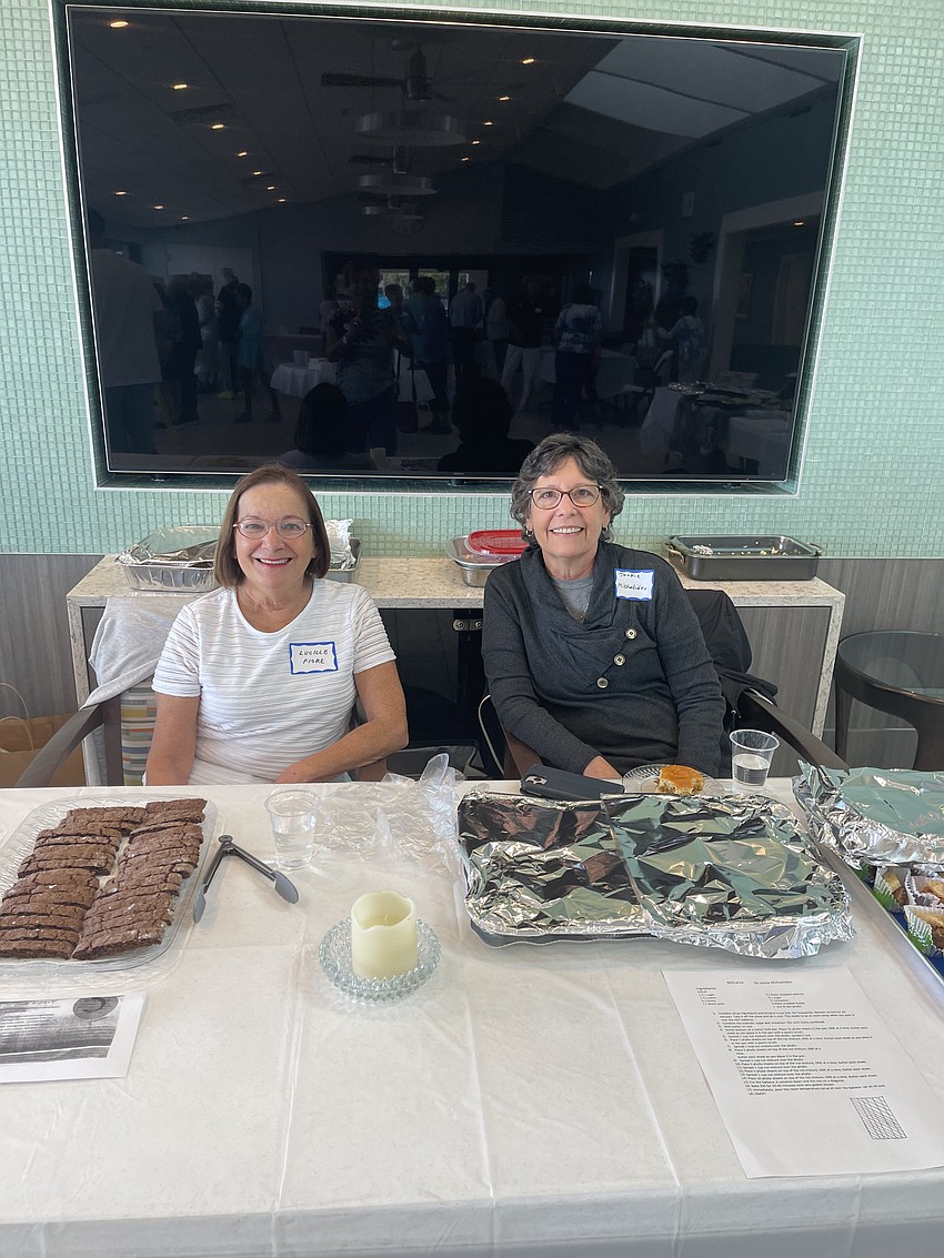 Lucille Fiore and Jackie Michaelides serve up biscotti and baklava.