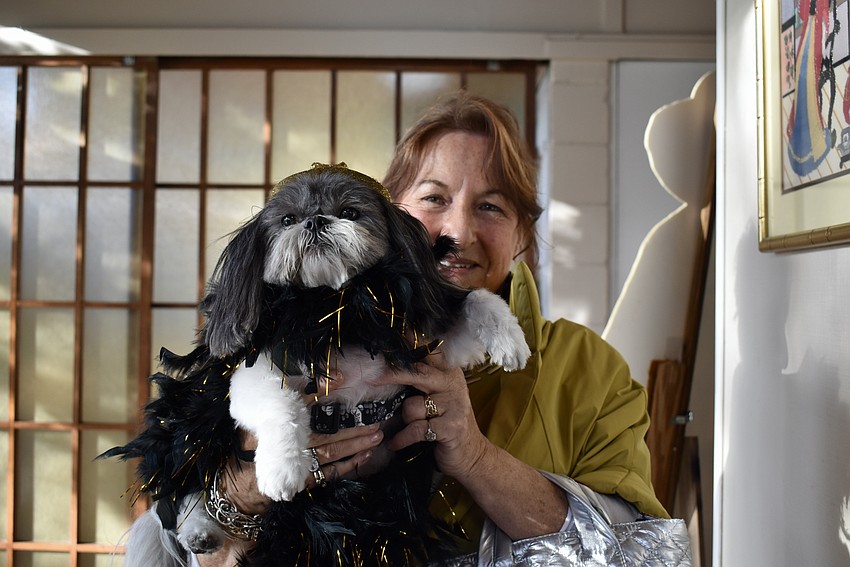 Panache with Pooches Fashion Show models Zooey and Sandy Koolkin give their best pose.