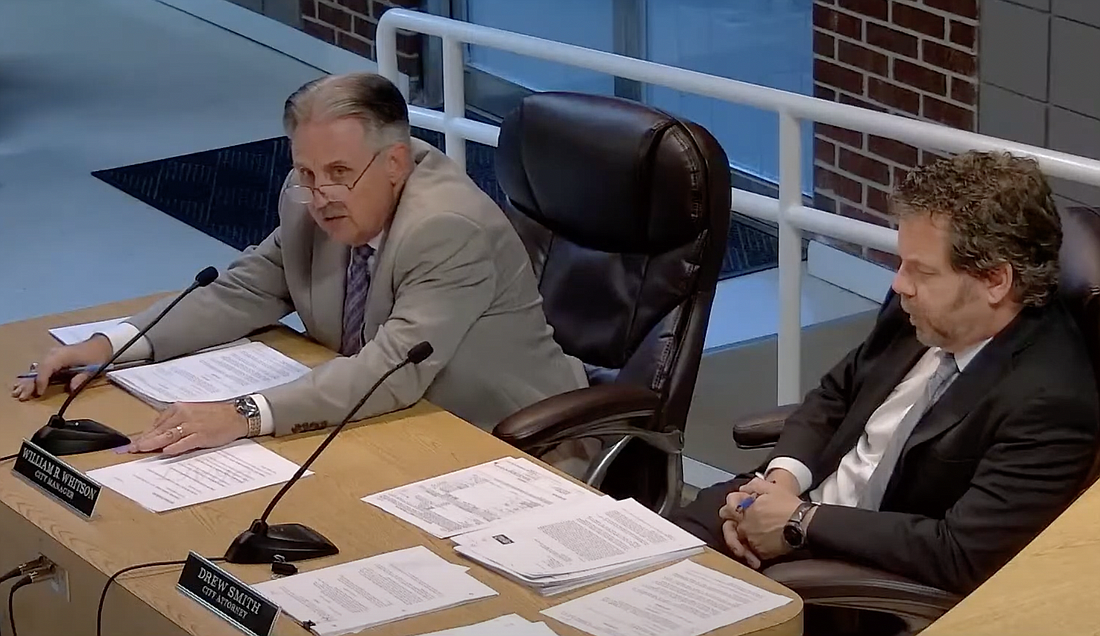 City Manager William Whitson (left) was fired at the Feb. 9 City Commission meeting.