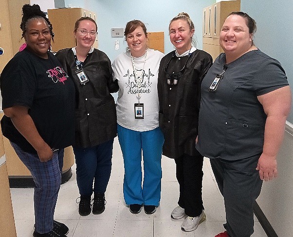 DOH-Volusia Dental Clinic staff members Charlotte Miller, Nichole Vega, Rebecca Granoski, Denise Orlando and Jamie Satterfield. Courtesy photo