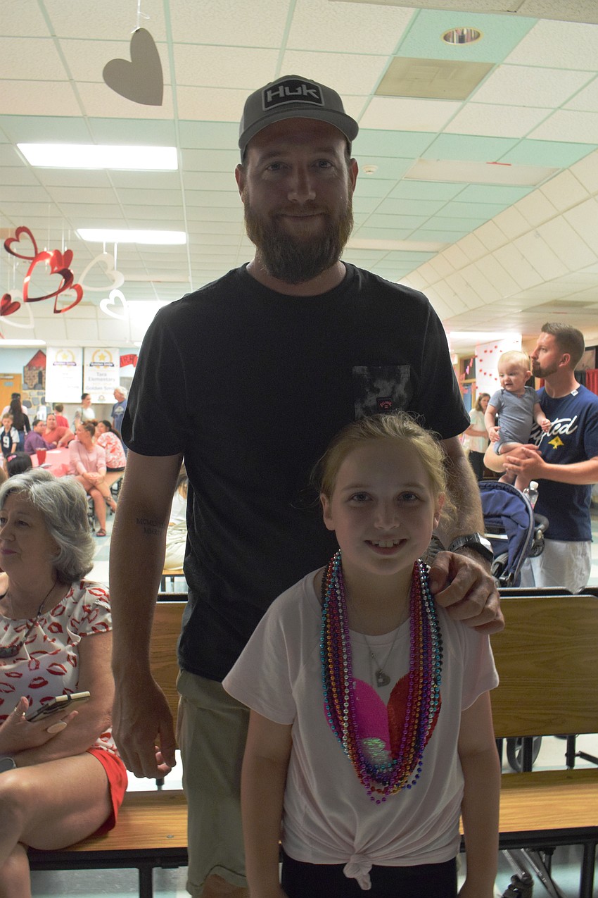 Daniel Sapuppo's second grader Callie Sapuppo performed with the dance team before the sweetheart dance began. 