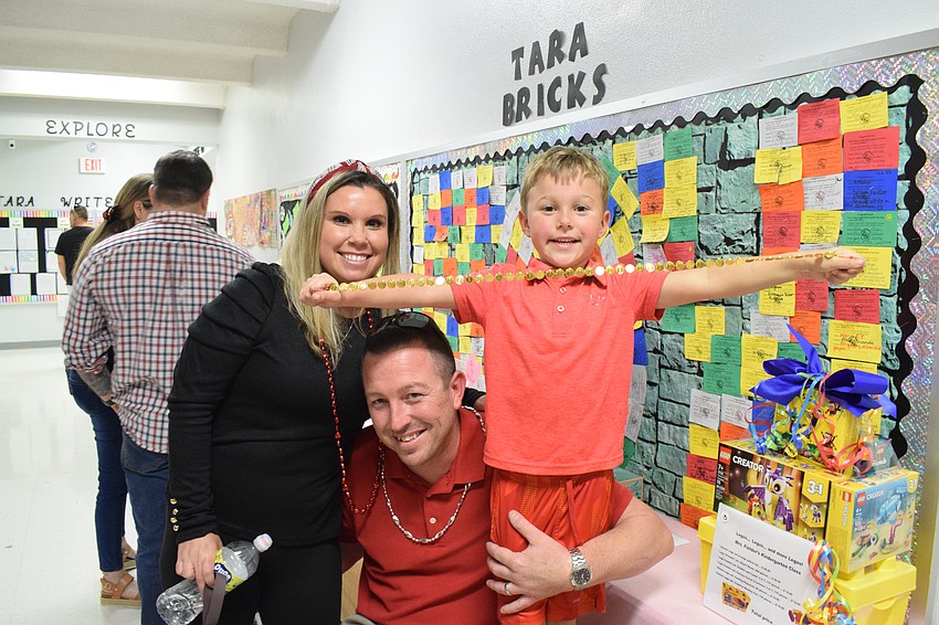 Danielle Jones and Eddie Jones took their kindergartner Grant Jones to his first sweetheart dance.