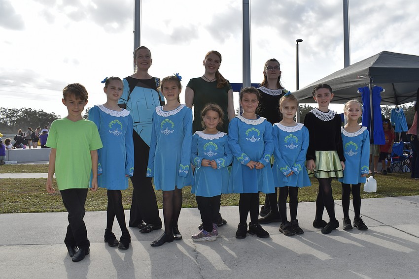 The Irish Dance Academy of Sarasota perform for the families before handing out books.