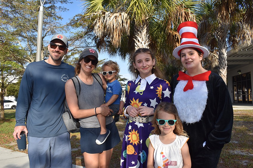 Jason, Mara, Callan and Kaia Putt with Ms. Frizzle and Dr. Seuss