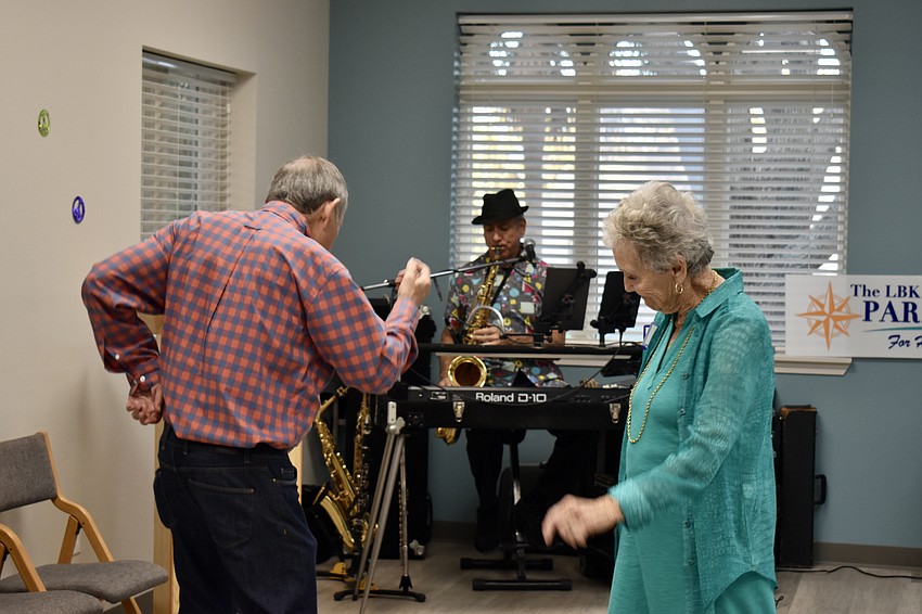 Vice-president of the board Ken Newmark and Janet Milliken get the dancing started.