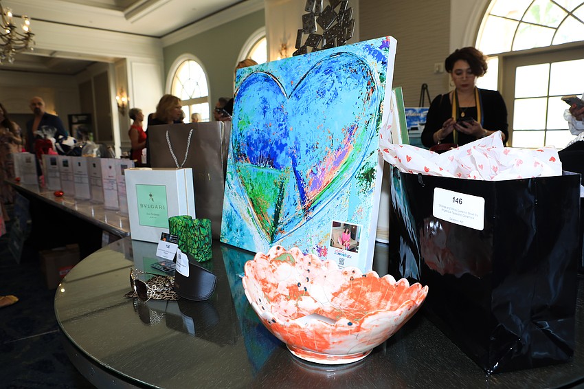 Guests checked out silent auction items.