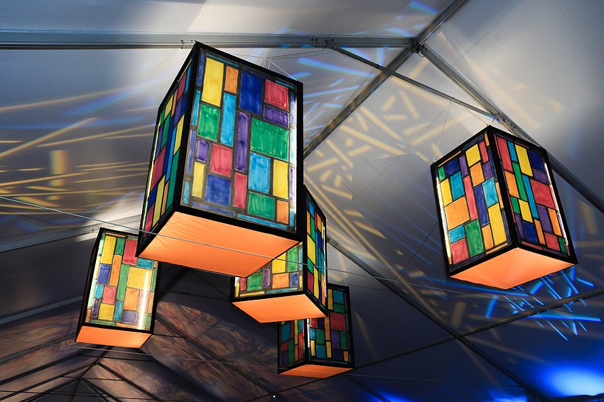 The tent's interior had a intricate stained glass aesthetic.