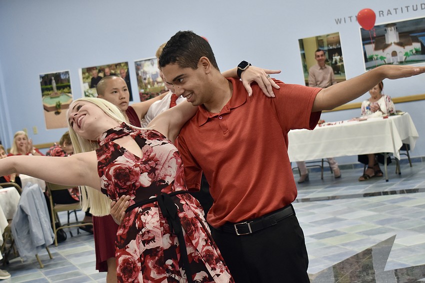 Dynasty Dance Club owner Sarah Lototskyy dances with Dynasty Star Jordan Soriano.