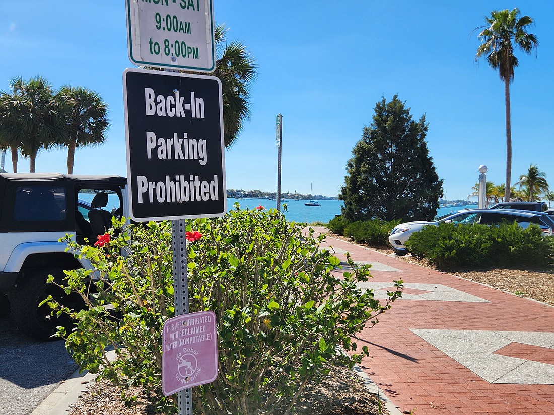 A sign at Bayfront Park reminds drivers back-in parking is not permitted there. That could change at the city manager's discretion thanks to an ordinance amendment approved by the City Commission.