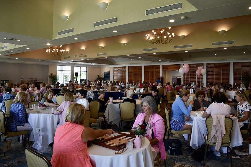 Members of the Longboat Key Club gather on Feb. 15 to play cards and raise money for Breast Health Sarasota, Inc.