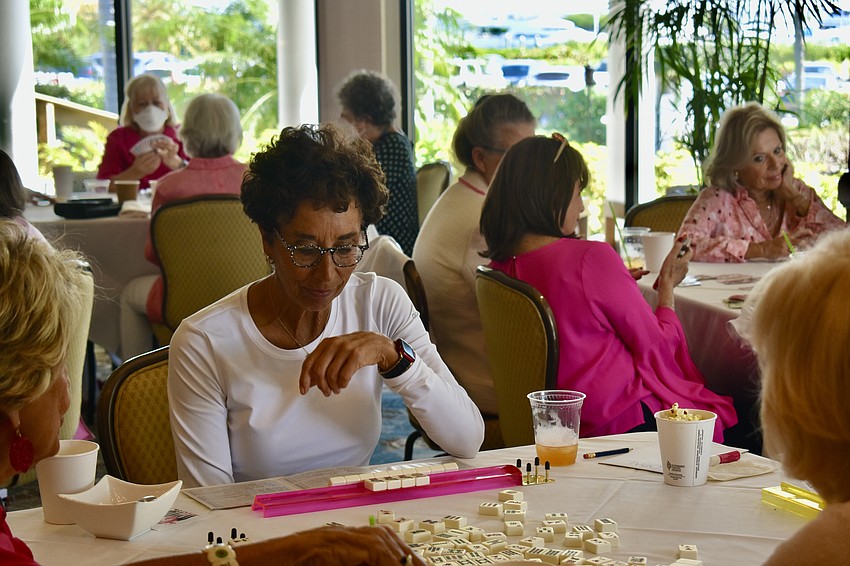 Amy Renninger plays Mahjong.