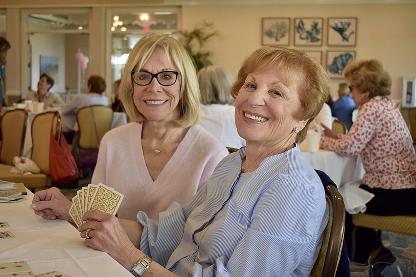 Terry Neis and Sandra Krause play cards for a cause.