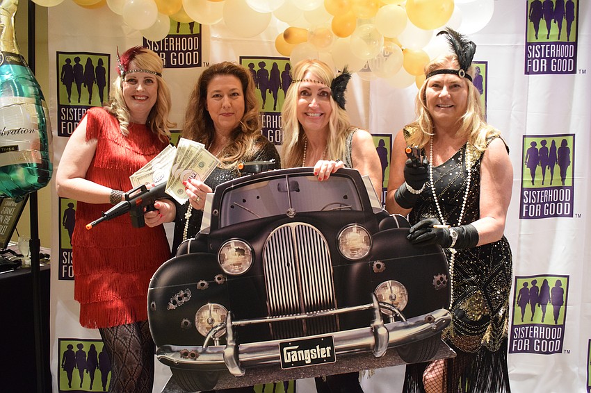 Lakewood Ranch's Christy Carey, Angie Graham, Judy Heuerman and Valerie Esposito go all out for the Gatsby theme. 