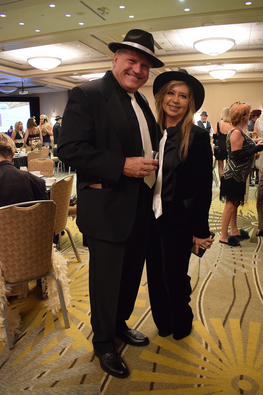 Lakewood Ranch's Matt and Lori Augustyniak are excited to dress for the Gatsby theme while supporting Sisterhood for Good. 
