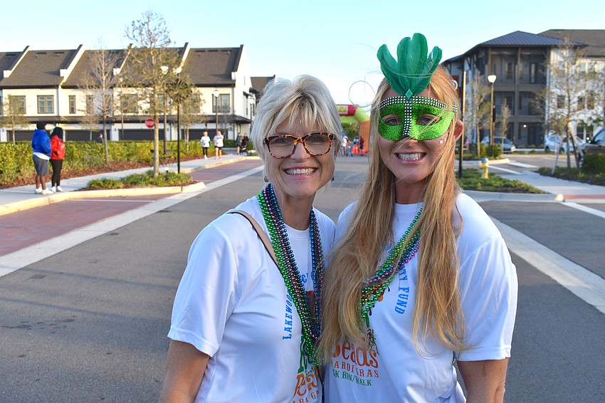 Marian Trumpler and her daughter, Jenna Trumpler, sported the appropriate colors for the race. Jenna is a personal trainer at the Lakewood Ranch YMCA.