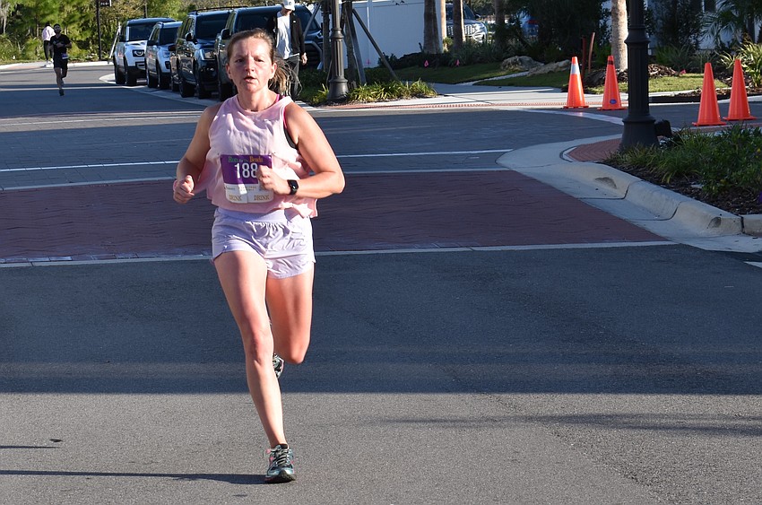 Lakewood Ranch's Candice Rhine won the women's division of the Run for the Beads.