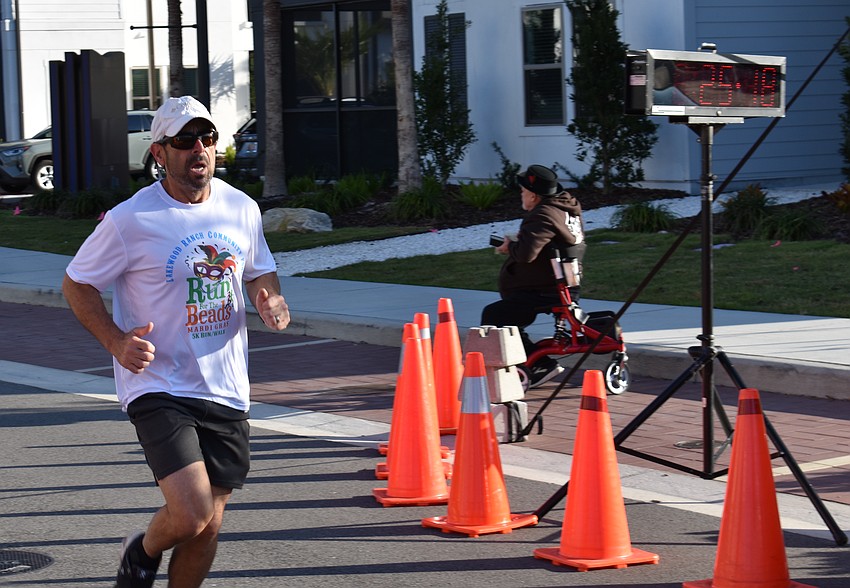Lakewood Ranch Community Fund Board Member David Fink showed he not only can help organize a race, he can run it, too.