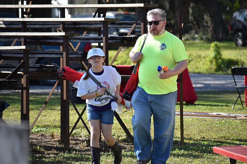 Lakewood Ranch's 8-year-old Carys Barry, and Richard Barry, attend the event in support of 15-year-old Sophie Barry.