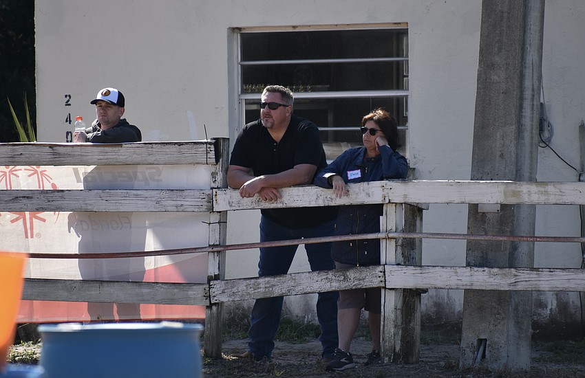 Bradenton's Michael Manuel, Lakewood Ranch's Chris Curtis, and Bradenton's Elaine McLaughlin watch the event up close.
