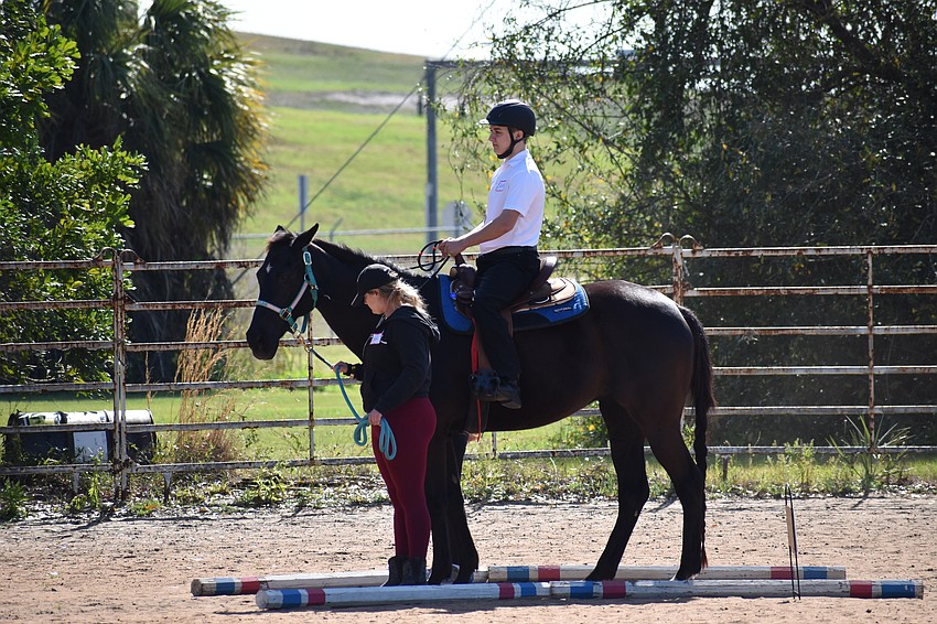Madison Curtis and Ellenton's 22-year-old Austin Ford come to a rest on the course.