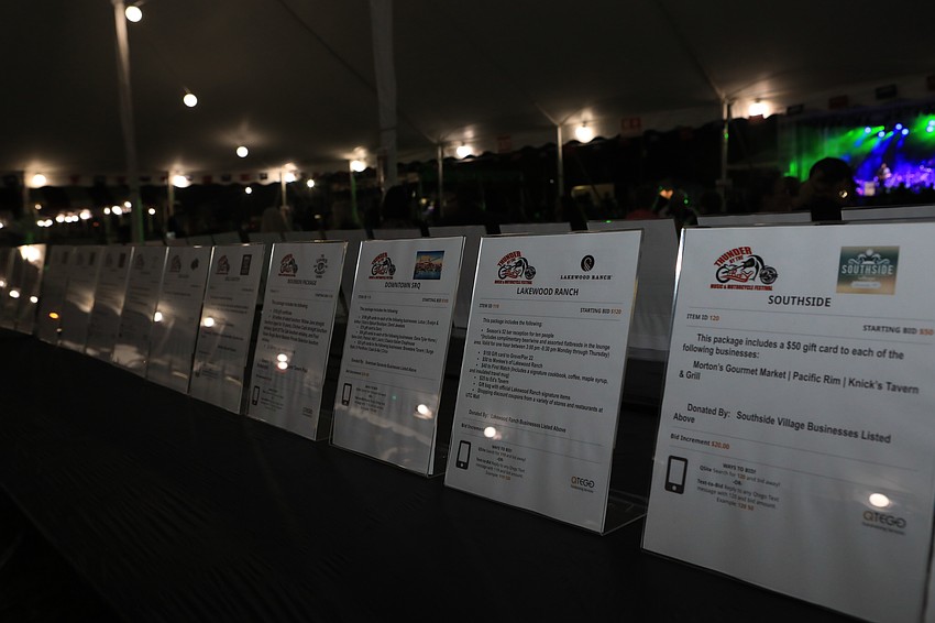 Guests bid on silent auction items.