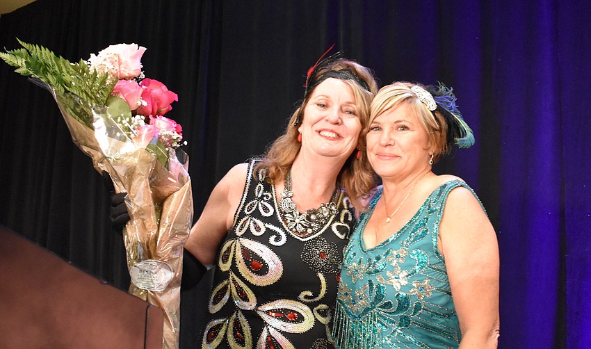 Sisterhood for Good's Amy Gorman and Angela Massaro-Fain share a moment during the Gatsby event.