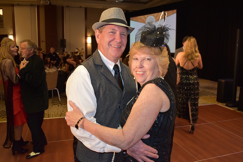 Chuck and Kathy Collums shows off their dance moves during the fundraiser.