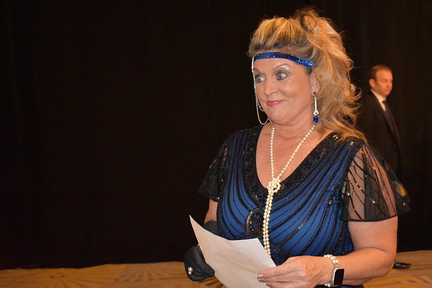 Lakewood Ranch's Peggy Kronus gets ready to address the crowd at the Sisterhood for Good's fundraiser.