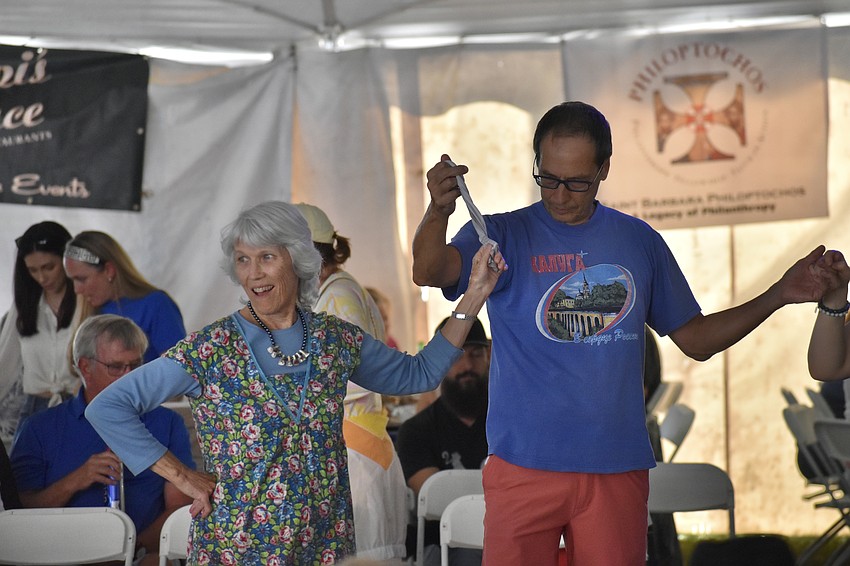 Longboat Key's June Morse and Clearwater's John Yacalis take to the dance floor as event guests.