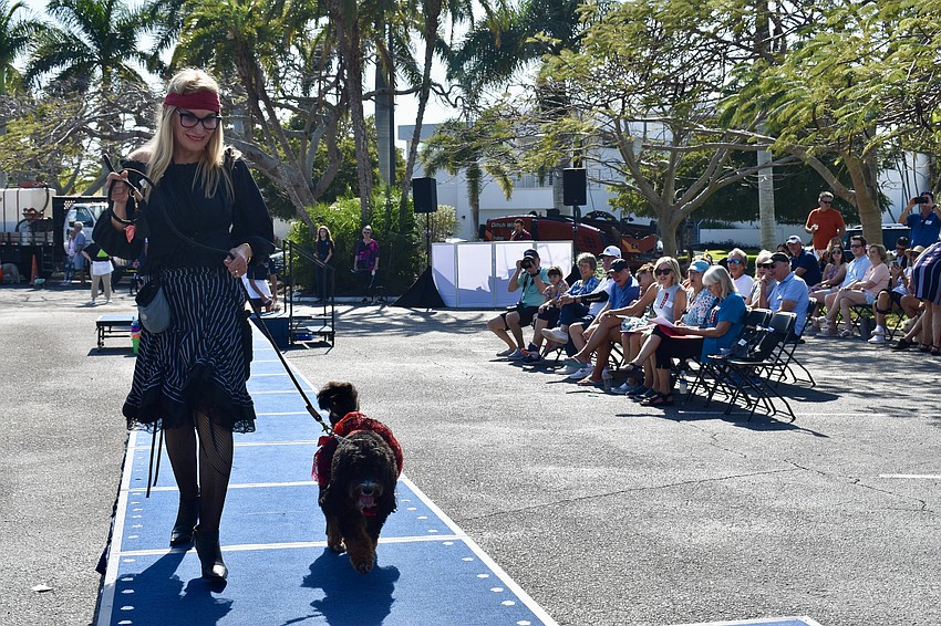 Lynne Short and Izzy wear matching pirate costumes.