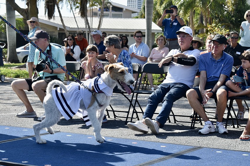 Maya sails down the runway.