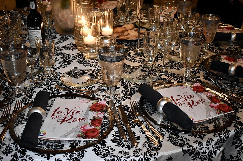 The theme for the evening is La Vie en Rose.