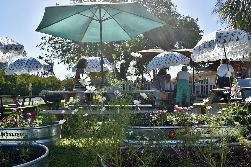 Driftwood Beach Home & Garden hosts a class in the garden.