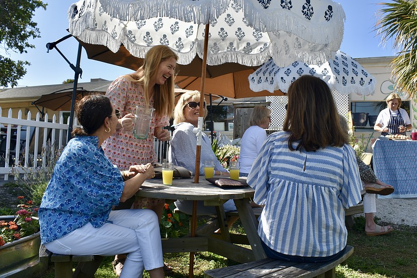 Owner Heather Rippy refreshes the mimosas.