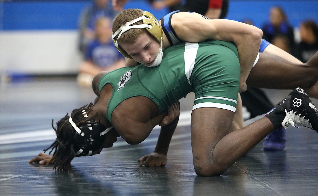 Matanzas' Kaden Golder in a match against Flagler Palm Coast. Golder was the Pirates only champ at the District 2-3A meet on Feb. 15. Photo by Brent Woronoff