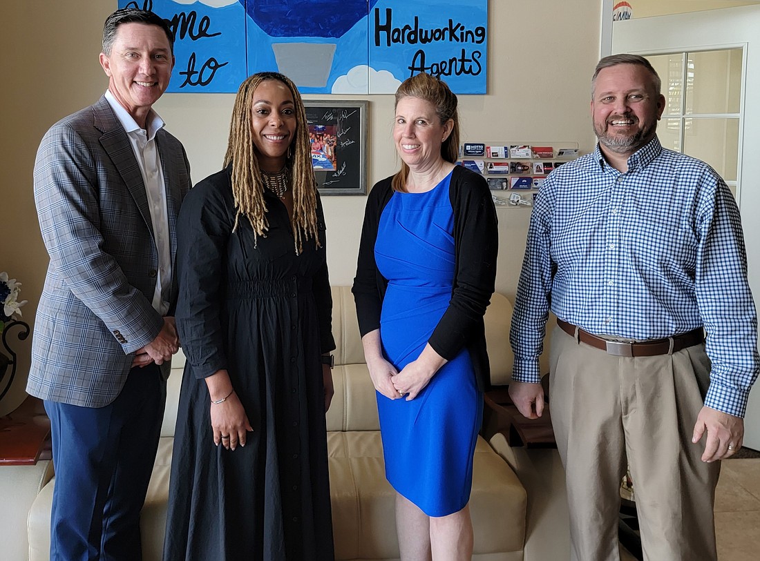 Pictured are RE/MAX Alliance Group Broker and Co-Owner Peter Crowley, RE/MAX Capital Realty founder Kendall Bonner, RE/MAX Capital Realty Office Administrator Sharon Hayes and RE/MAX Capital Realty Managing Broker Shadd Boucher.